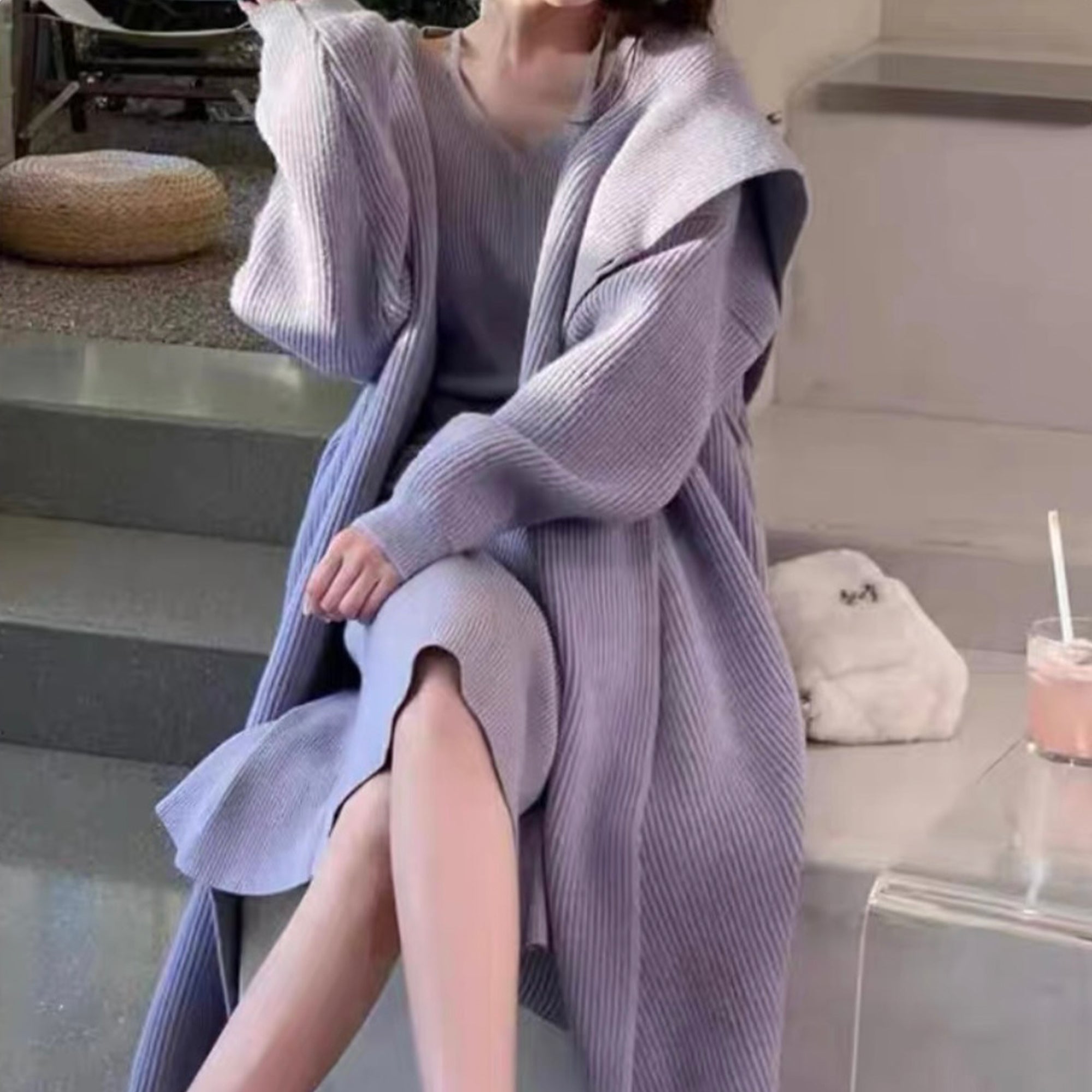 Woman wearing hand-knit alpaca wool cardigan coat