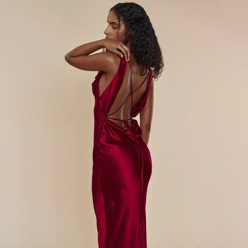 Woman wearing backless lace-up evening gown