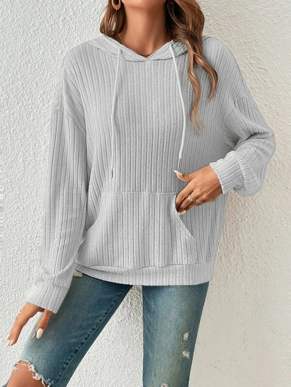 Front pocket detail on women's hooded sweatshirt