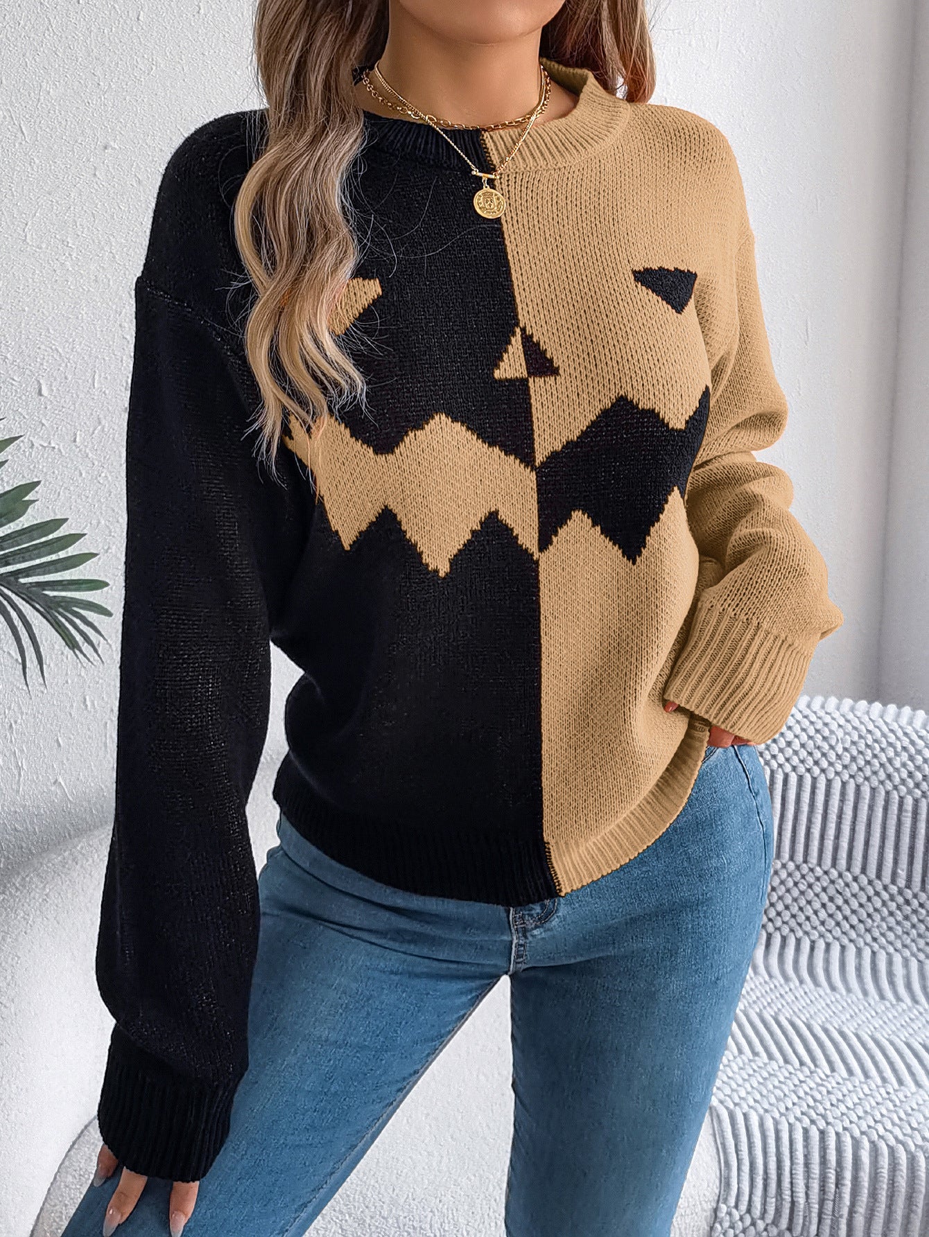 Size guide for women's Halloween ghost pattern sweater