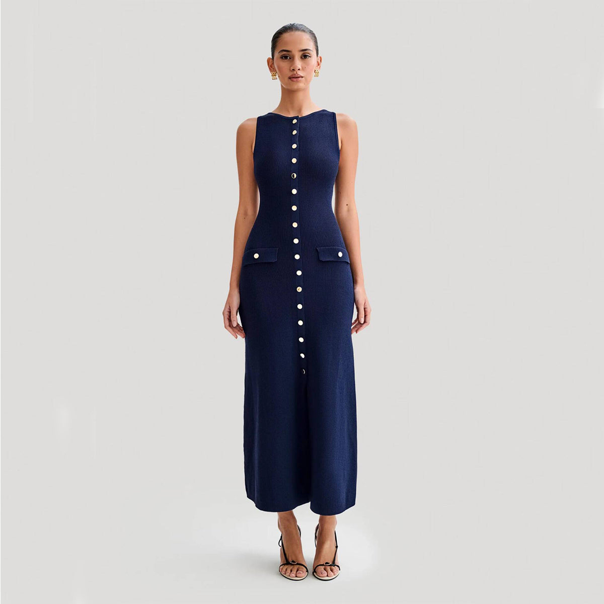 Woman wearing knitted sleeveless round neck dress