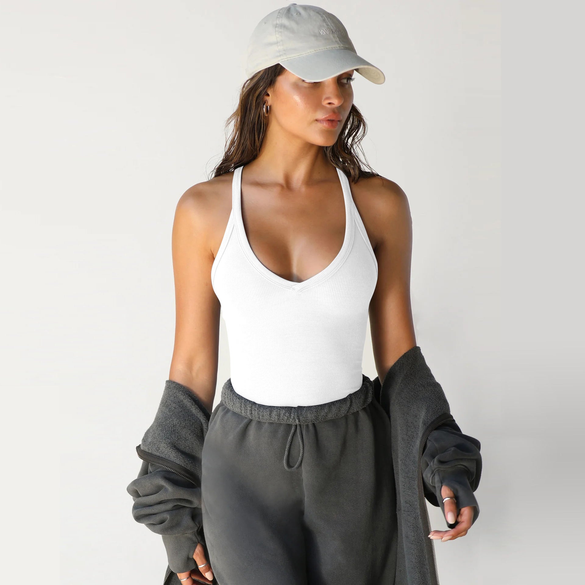 Woman wearing knitted slim vest top