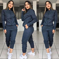 Woman wearing matching long sleeve pants suit set