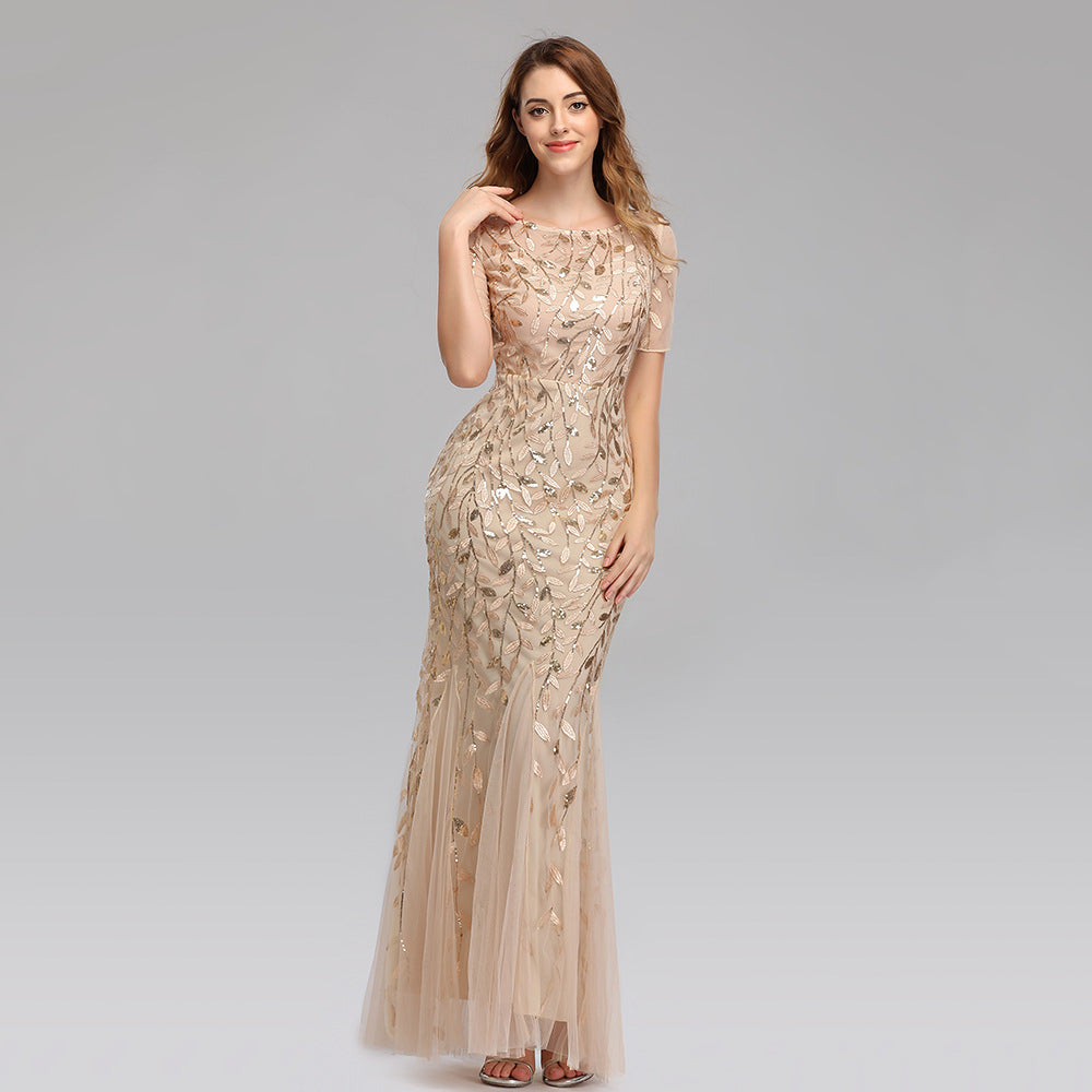 Close-up of pearl mesh detail on evening gown