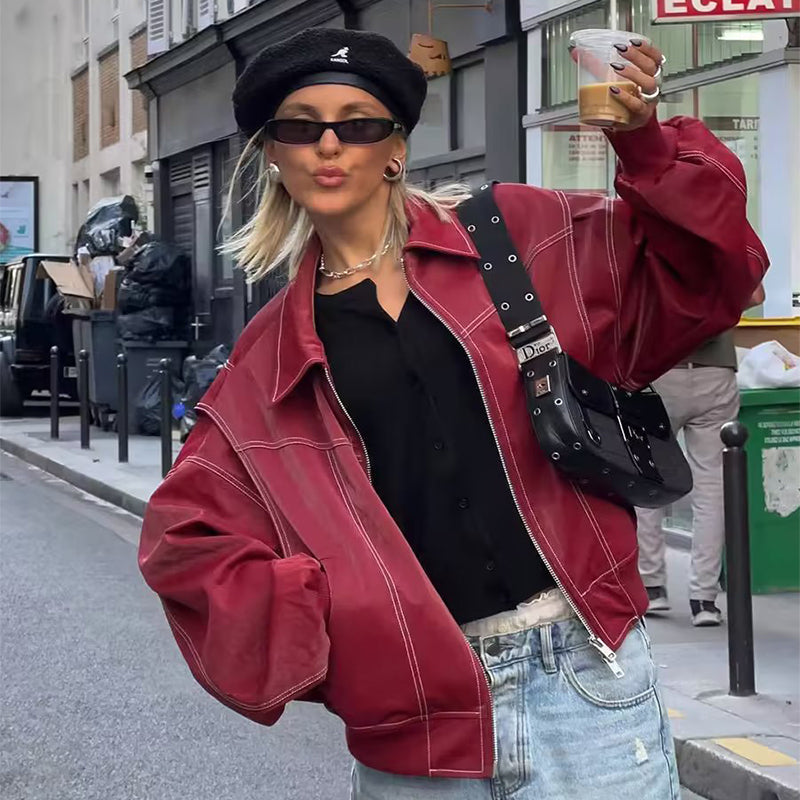 Woman wearing sleeveless moto zip-up vest