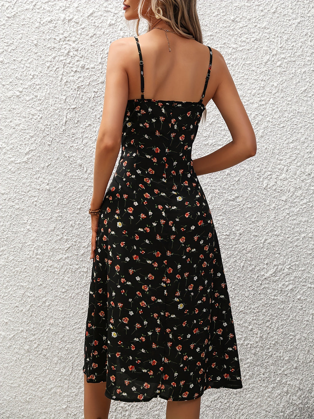 Close-up of side split detail on maxi dress