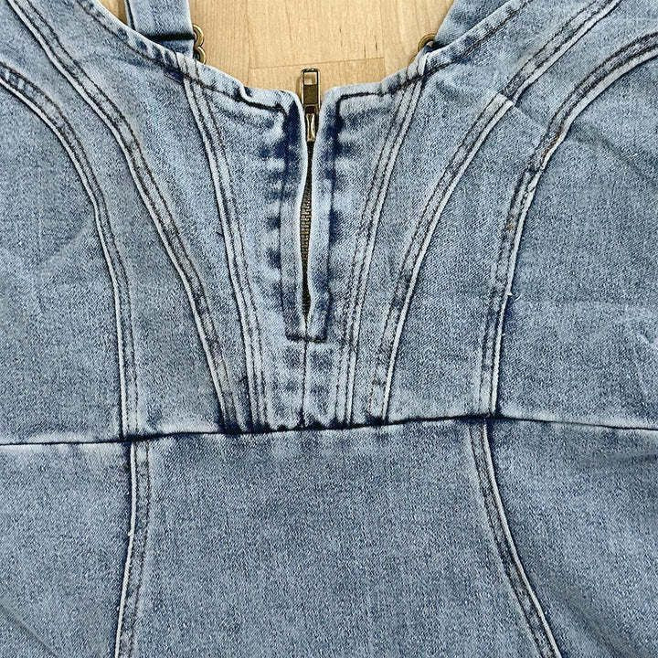 Women's denim suspender dress lifestyle photo