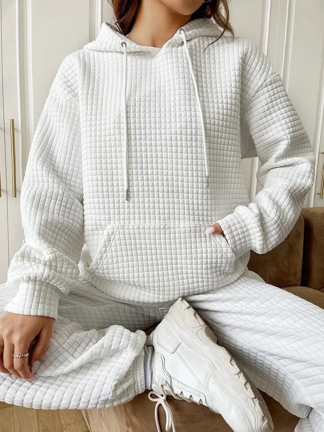 Woman wearing waffle knit long sleeve sweatshirt